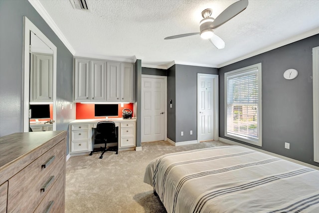 bedroom with light colored carpet, a textured ceiling, ornamental molding, baseboards, and ceiling fan