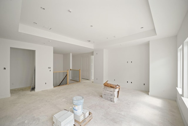 5223 Mimosa Dr, Bellaire, TX 77401 - unfurnished living room featuring a raised ceiling