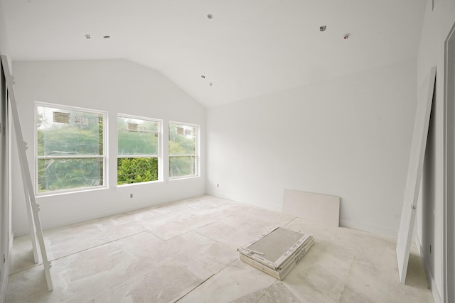 5223 Mimosa Dr, Bellaire, TX 77401 - empty room featuring vaulted ceiling