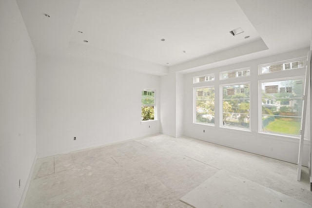 5223 Mimosa Dr, Bellaire, TX 77401 - spare room with a tray ceiling
