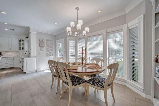 206 Greenbriar Ave, Friendswood, TX 77546 - dining space featuring a chandelier, ornamental molding, baseboards, recessed lighting, and light tile patterned flooring