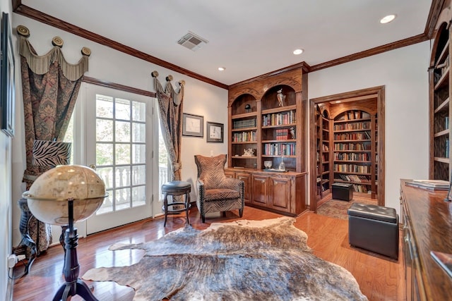 206 Greenbriar Ave, Friendswood, TX 77546 - office area with light wood-style flooring, crown molding, recessed lighting, and built in features