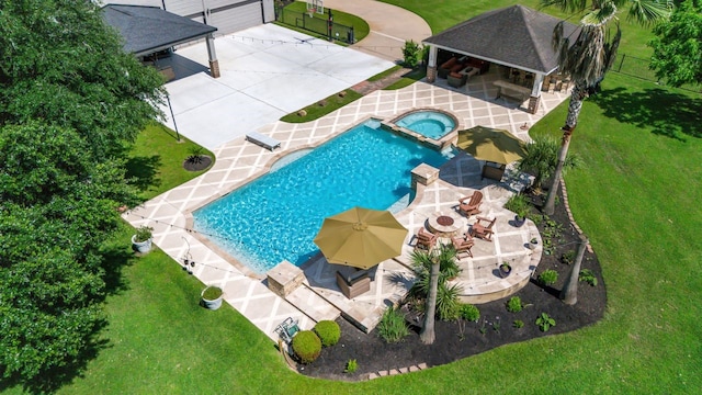 206 Greenbriar Ave, Friendswood, TX 77546 - view of swimming pool featuring a patio area, a gazebo, and a pool with connected hot tub