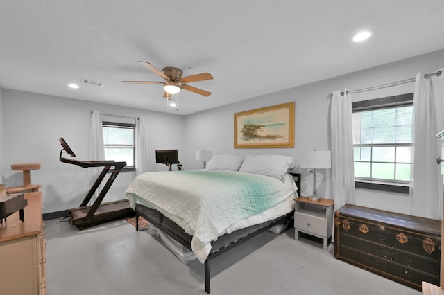 315 Cessna Rd, Trinity, TX 75862 - bedroom featuring recessed lighting, concrete floors, and a ceiling fan