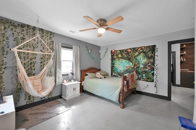 315 Cessna Rd, Trinity, TX 75862 - bedroom with finished concrete floors, ceiling fan, and baseboards