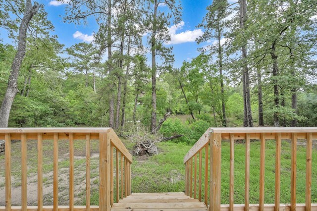 315 Cessna Rd, Trinity, TX 75862 - deck with a yard and a forest view