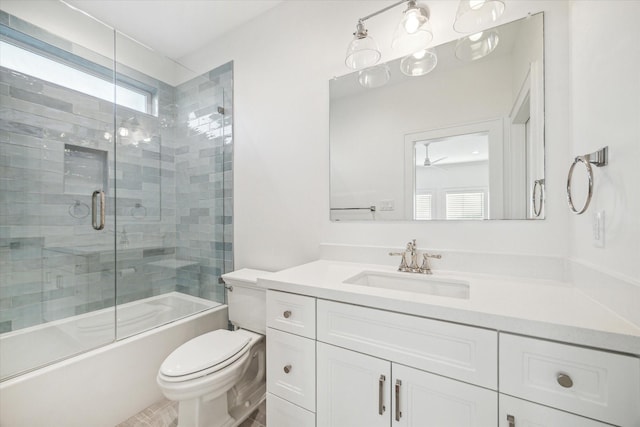 319 E 26th St, Houston, TX 77008 - full bath featuring toilet, vanity, bath / shower combo with glass door, and a ceiling fan