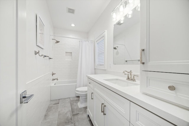 319 E 26th St, Houston, TX 77008 - bathroom featuring toilet, vanity, shower / bath combo with shower curtain, tile patterned flooring, and recessed lighting