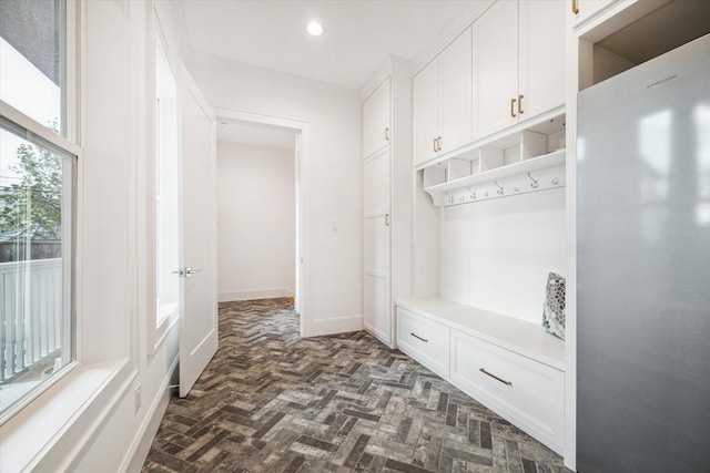 319 E 26th St, Houston, TX 77008 - mudroom with recessed lighting, baseboards, and brick floors