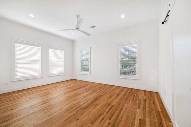 319 E 26th St, Houston, TX 77008 - spare room with crown molding, light wood finished floors, baseboards, recessed lighting, and ceiling fan