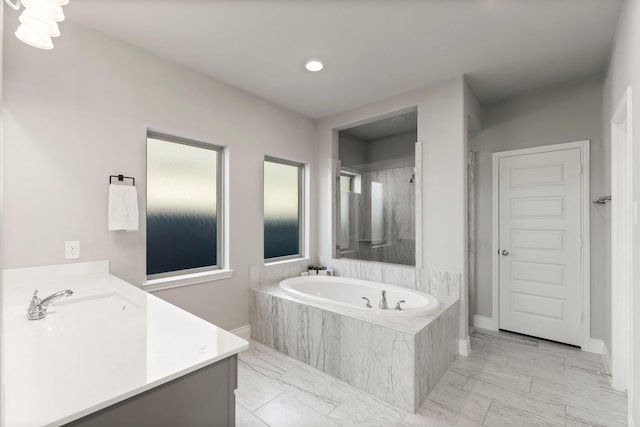 19419 Filly Chase Ct, Tomball, TX 77377 - bathroom with marble finish floors, a bath, vanity, recessed lighting, and a shower
