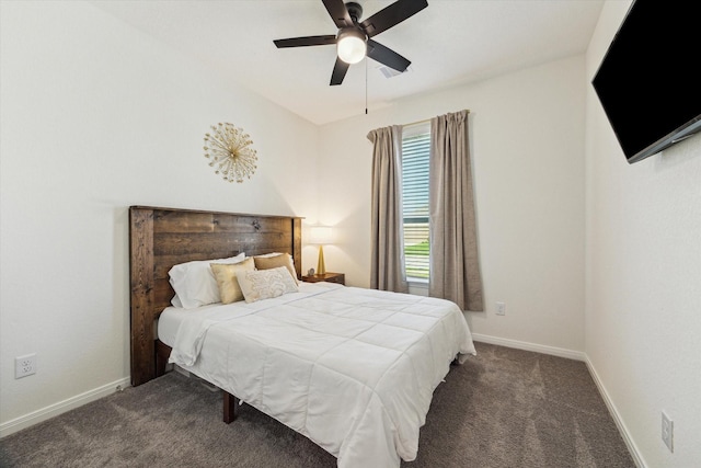 bedroom with carpet floors, baseboards, and a ceiling fan