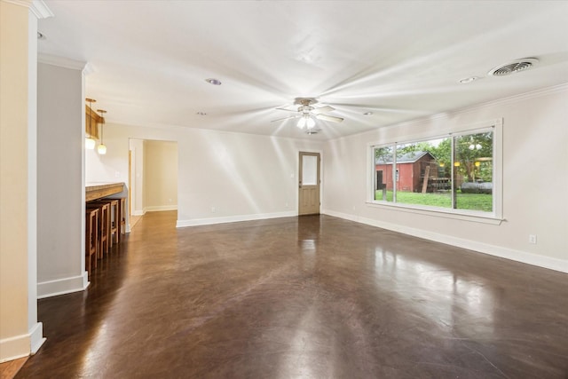 13016 W Burton St, Burton, TX 77835 - unfurnished room with ceiling fan, baseboards, finished concrete floors, and crown molding