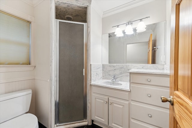 13016 W Burton St, Burton, TX 77835 - bathroom featuring a stall shower, vanity, crown molding, toilet, and wainscoting