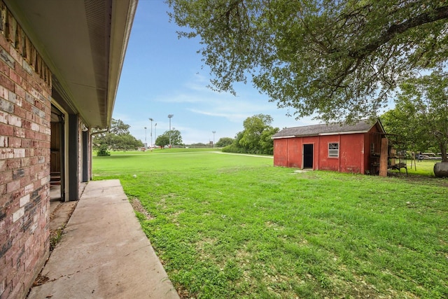 13016 W Burton St, Burton, TX 77835 - view of grassy yard featuring an outdoor structure