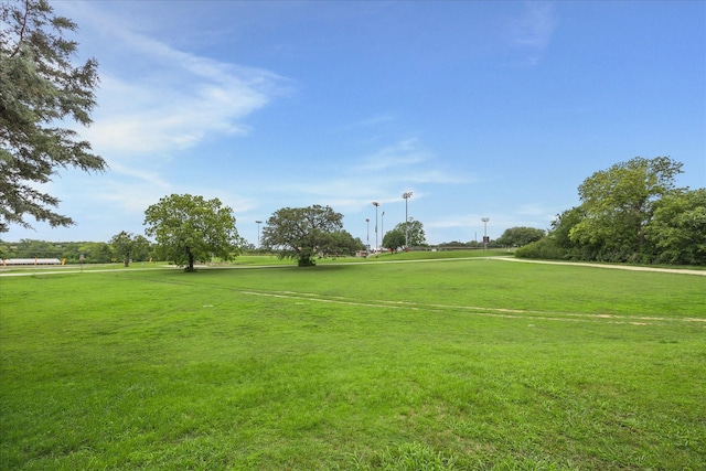 13016 W Burton St, Burton, TX 77835 - surrounding community featuring a lawn