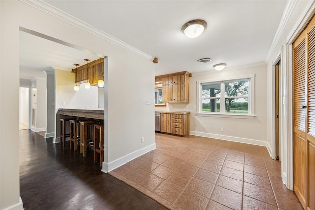 13016 W Burton St, Burton, TX 77835 - kitchen featuring ornamental molding, baseboards, and dishwasher