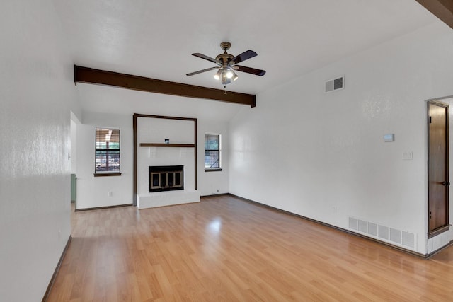 132 Prairie View Ln, Red Oak, TX 75154 - unfurnished living room with a ceiling fan, light wood-style floors, baseboards, and a fireplace