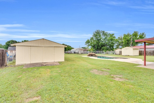 132 Prairie View Ln, Red Oak, TX 75154 - view of yard with a storage unit and an outdoor structure