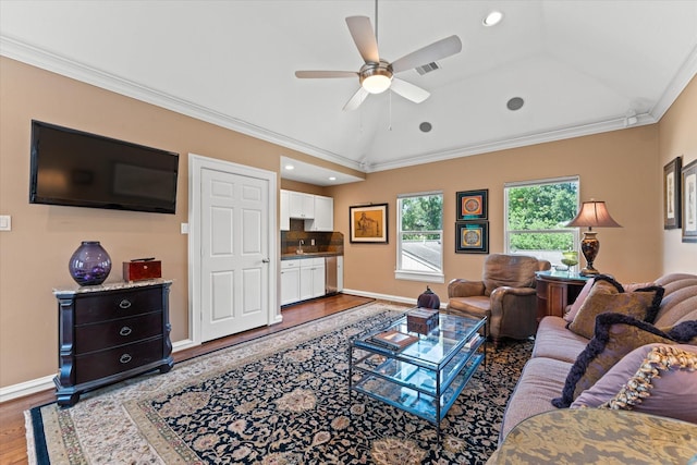 5206 Stamper Way, Houston, TX 77056 - living room with crown molding, wood finished floors, a ceiling fan, baseboards, and vaulted ceiling