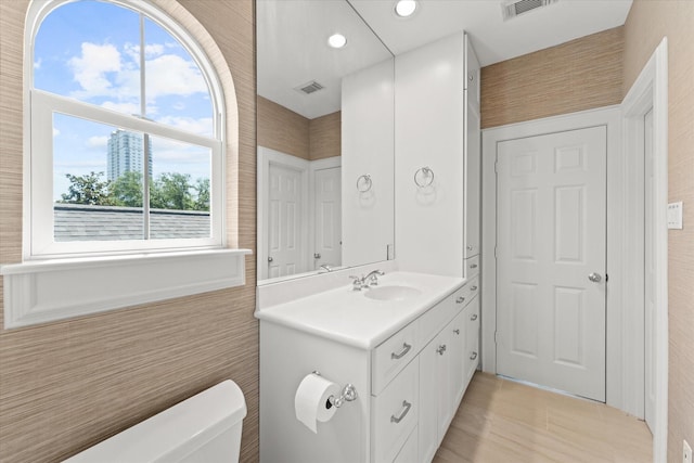 5206 Stamper Way, Houston, TX 77056 - bathroom featuring toilet, vanity, and recessed lighting