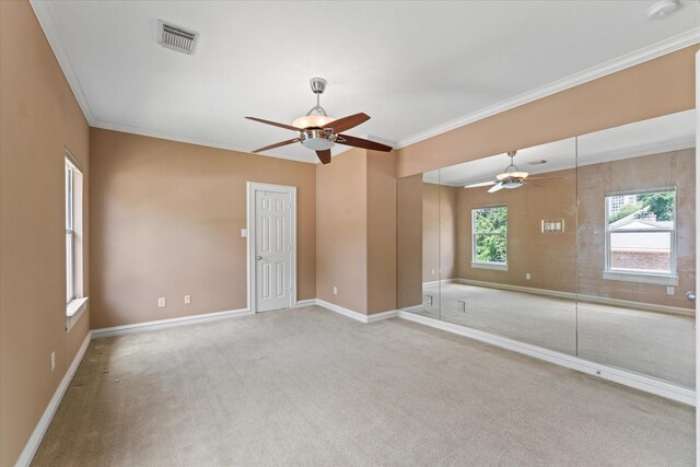 5206 Stamper Way, Houston, TX 77056 - carpeted spare room with ceiling fan, baseboards, and crown molding