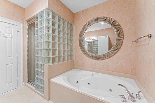 5206 Stamper Way, Houston, TX 77056 - full bathroom featuring wallpapered walls, a tub with jets, a stall shower, and tile patterned flooring