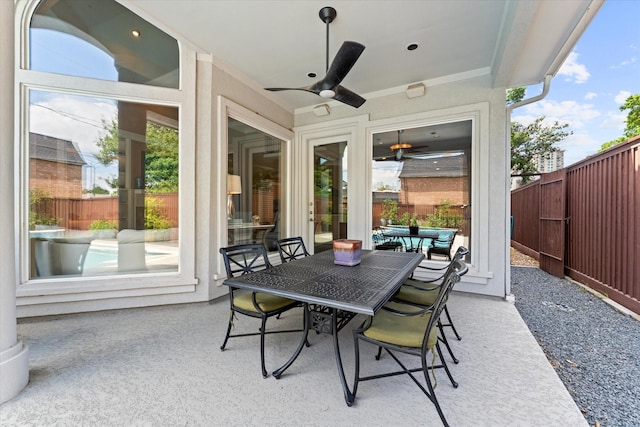 5206 Stamper Way, Houston, TX 77056 - view of patio with fence, a ceiling fan, and outdoor dining space