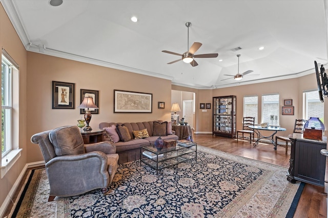 5206 Stamper Way, Houston, TX 77056 - living area with healthy amount of natural light, dark wood-style floors, ceiling fan, vaulted ceiling, and ornamental molding