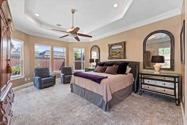 5206 Stamper Way, Houston, TX 77056 - carpeted bedroom with multiple windows, a raised ceiling, ornamental molding, a ceiling fan, and recessed lighting