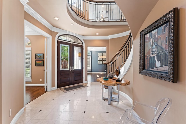 5206 Stamper Way, Houston, TX 77056 - tiled foyer featuring ornamental molding, plenty of natural light, baseboards, and recessed lighting