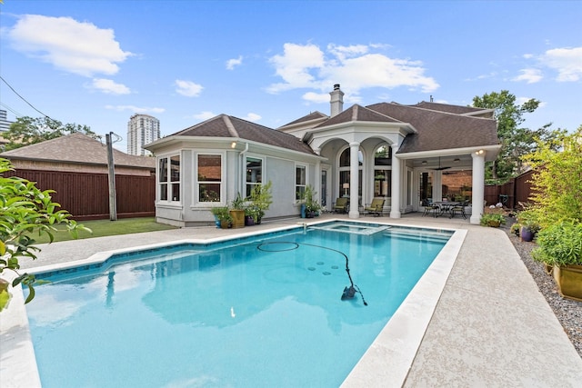 5206 Stamper Way, Houston, TX 77056 - view of swimming pool with a fenced backyard, a patio, a pool with connected hot tub, and ceiling fan