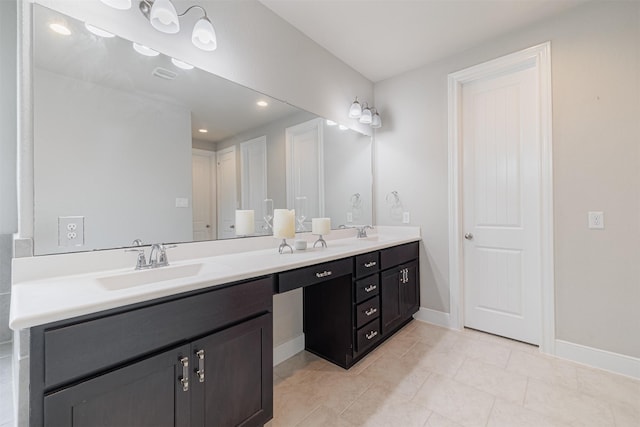3514 Hampton Landing Ct, Katy, TX 77494 - full bathroom with double vanity, baseboards, tile patterned floors, and recessed lighting