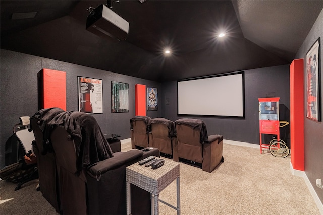 3514 Hampton Landing Ct, Katy, TX 77494 - cinema room featuring lofted ceiling, carpet floors, baseboards, and a textured wall