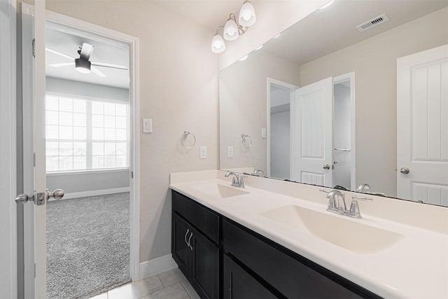 3514 Hampton Landing Ct, Katy, TX 77494 - full bath featuring double vanity, baseboards, ceiling fan, and tile patterned floors