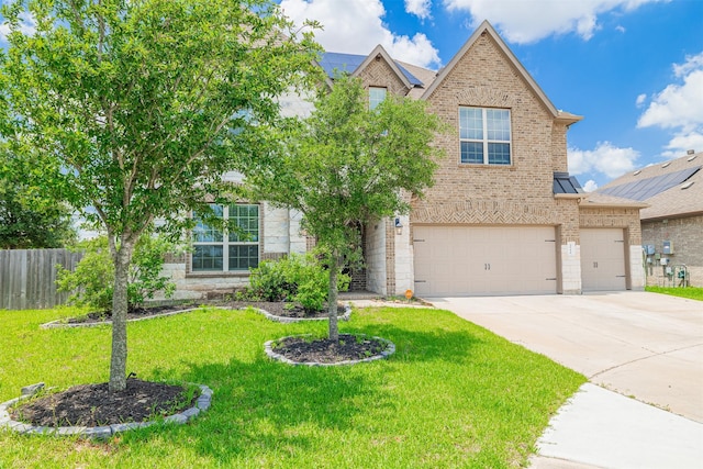 3514 Hampton Landing Ct, Katy, TX 77494 - view of front of property featuring brick siding, driveway, an attached garage, and stone siding
