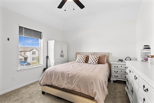 1526 Oakdale Crest Rd, Montgomery, TX 77316 - bedroom featuring dark carpet, baseboards, and ceiling fan