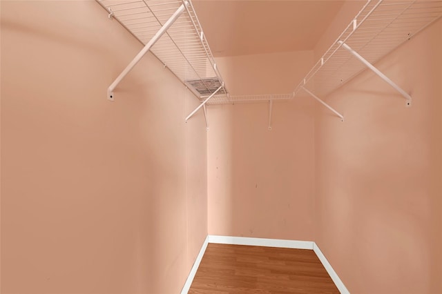 116 Linda St, Anahuac, TX 77514 - spacious closet with wood finished floors