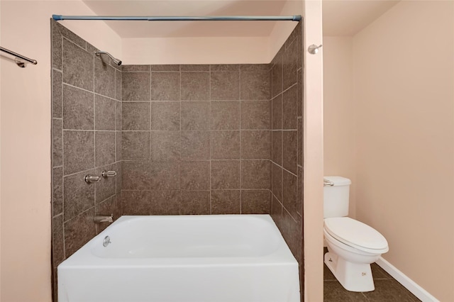 116 Linda St, Anahuac, TX 77514 - bathroom featuring toilet, tile patterned floors, baseboards, and shower / bathtub combination