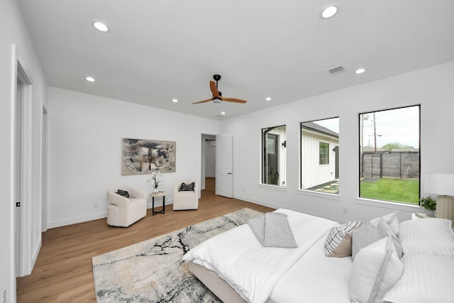 5520 Chapman St, Houston, TX 77009 - bedroom featuring recessed lighting, light wood-style floors, baseboards, and a ceiling fan