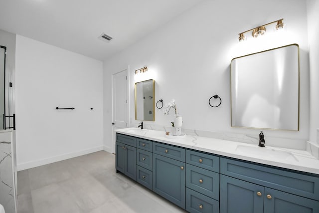 5520 Chapman St, Houston, TX 77009 - bathroom with double vanity and baseboards