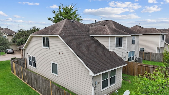 14502 Windmill Meadows Ct, Houston, TX 77082 - back of house with central air condition unit and roof with shingles