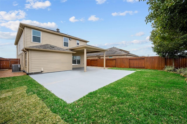 back of property with cooling unit and a patio area