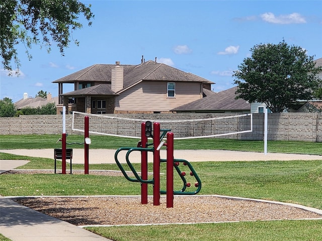 view of community featuring volleyball court