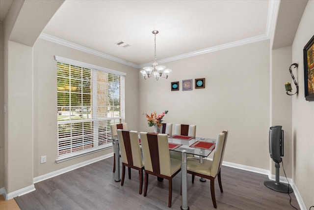 4603 Tamara Heights Ln, Sugar Land, TX 77479 - dining area with a chandelier, wood finished floors, ornamental molding, and baseboards