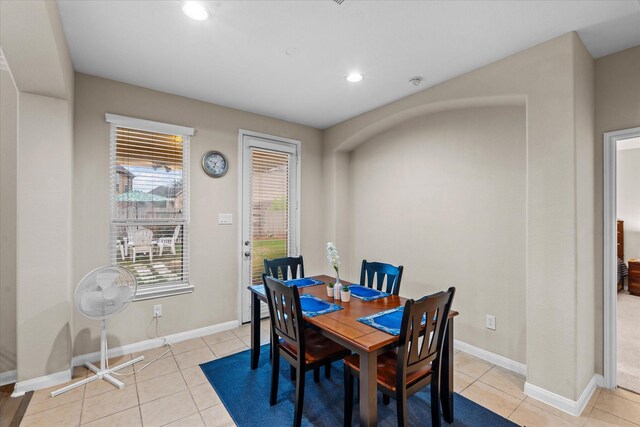 4603 Tamara Heights Ln, Sugar Land, TX 77479 - dining area with recessed lighting, light tile patterned floors, and baseboards
