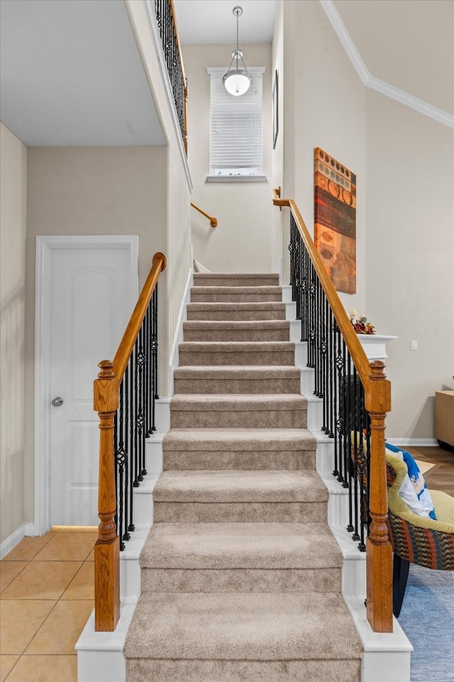 4603 Tamara Heights Ln, Sugar Land, TX 77479 - stairs featuring ornamental molding, baseboards, and tile patterned floors