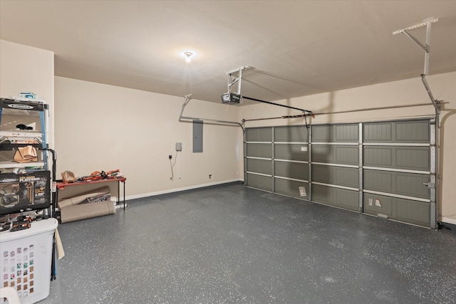 4603 Tamara Heights Ln, Sugar Land, TX 77479 - garage with a garage door opener, baseboards, and electric panel
