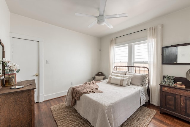 108 E 27th St, Houston, TX 77008 - bedroom with dark wood finished floors, a ceiling fan, and baseboards