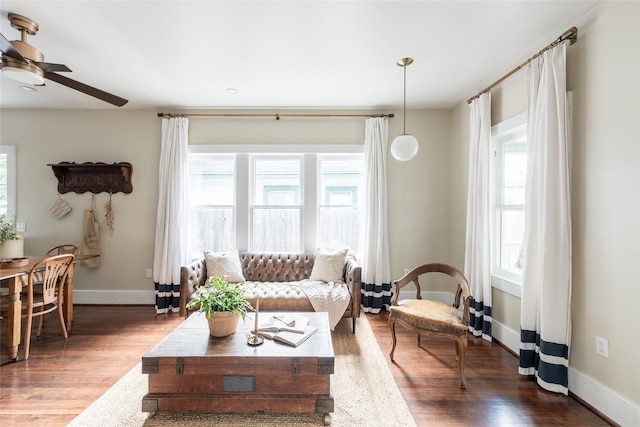 108 E 27th St, Houston, TX 77008 - living area featuring a ceiling fan, wood finished floors, and baseboards
